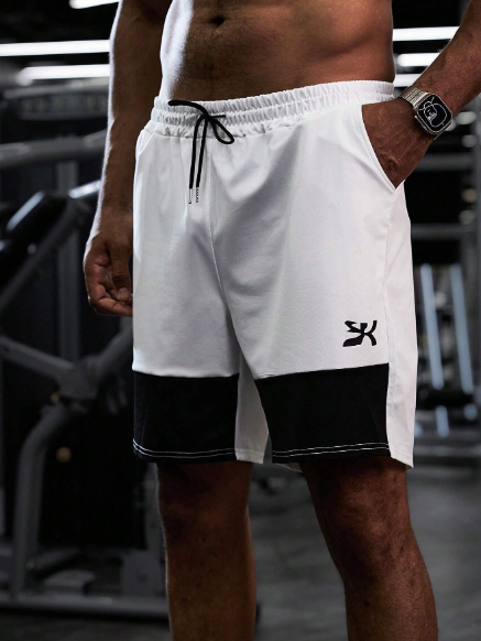 Men Geometric Printed Drawstring Waist Loose Casual Shorts With Pockets