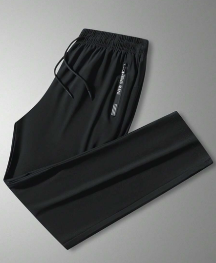 1pc Men's Letter Printed Breathable Zippered Pocket Sports Pants, Outdoor Casual Style Drawstring Straight Pants