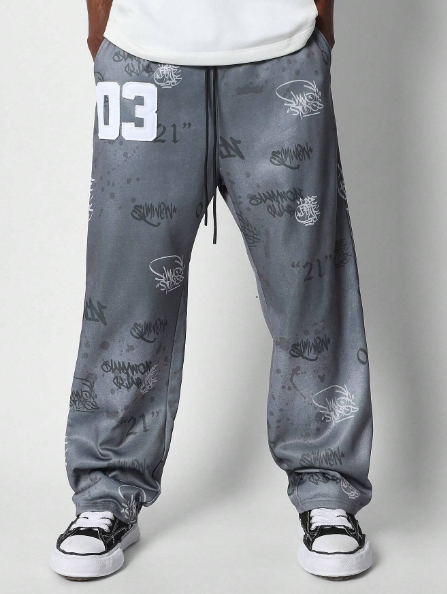 SUMWON Loose Fit Baggy Joggers With All Over Graffiti Graphic Print