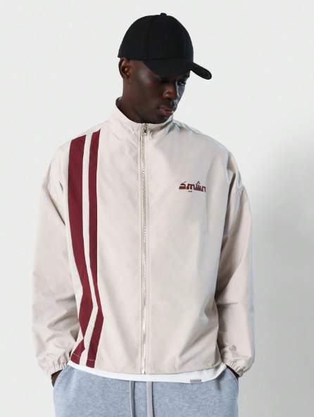 SUMWON Sporty Nylon Mock Neck Zip Through Track Jacket With Side Stripe And Small Graphic Print