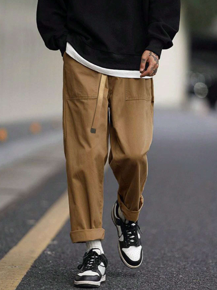 Manfinity Hypemode Loose Fit Men's Tapered Pants With Slant Pockets And Belt